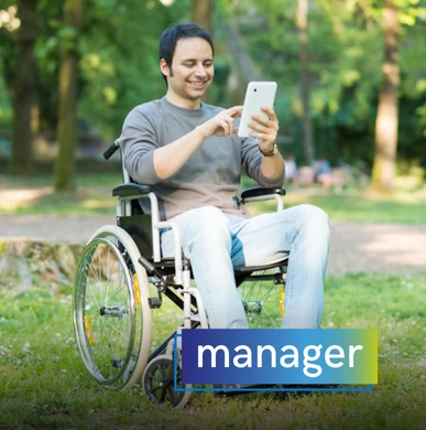Man in a wheelchair outdoors using a mobile device with a satisfied expression. Overlaid text: "manager".