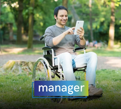 Man in a wheelchair outdoors using a mobile device with a satisfied expression. Overlaid text: "manager".